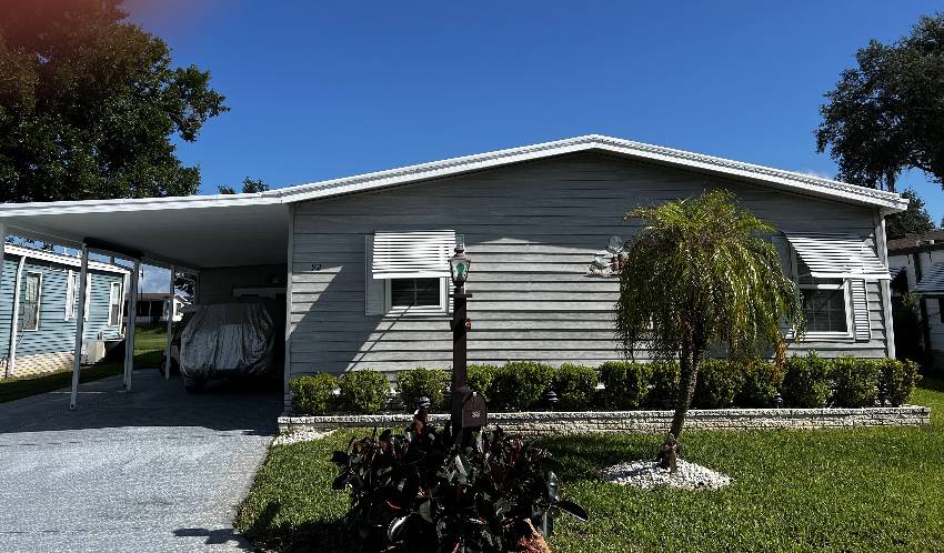 Winter Haven, FL Mobile Home for Sale located at 92 Greenview Dr Swiss Golf & Tennis